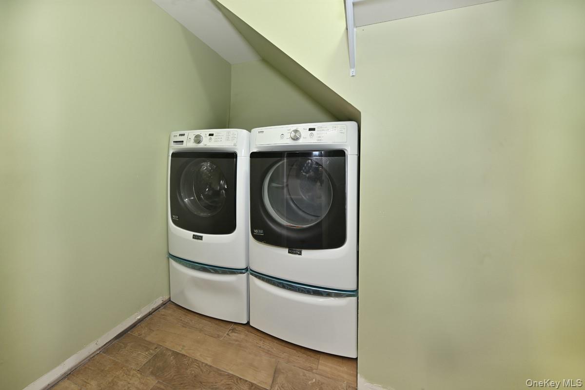 2 Elener Lane Spring Valley, NY 10977 - Photo 18 of 30 a utility room with dryer and washer