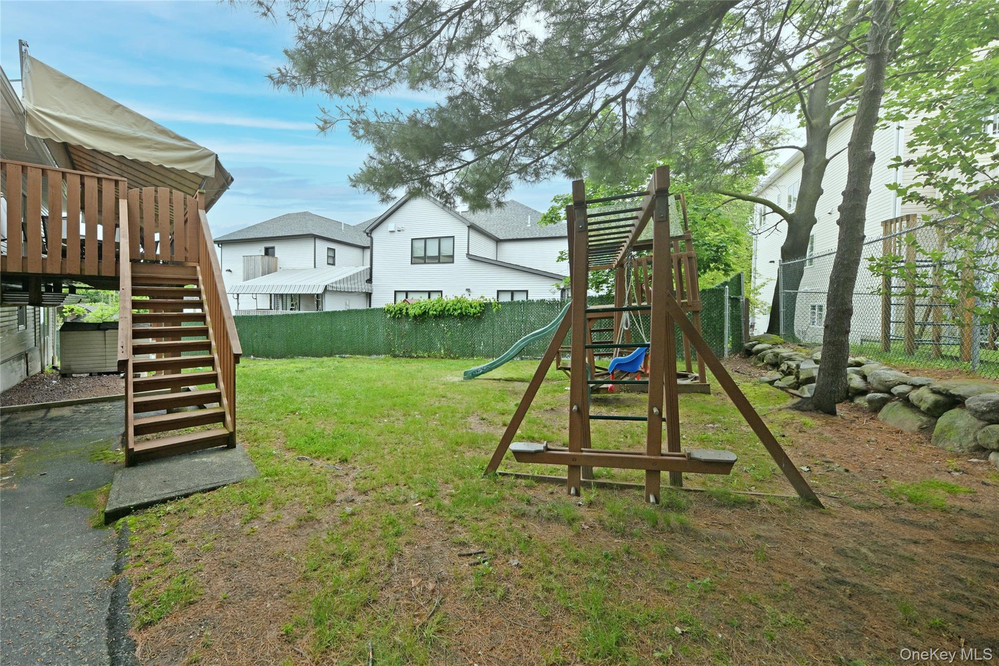 2 Elener Lane Spring Valley, NY 10977 - Photo 30 of 30 a view of a house with a park