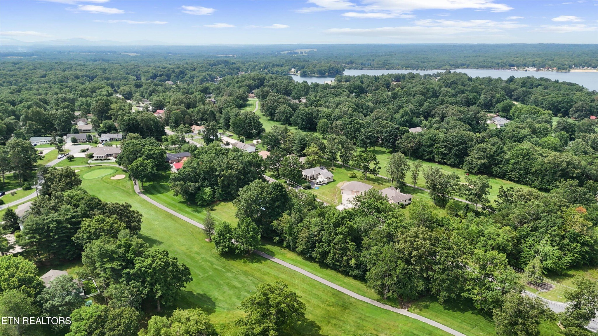 32 Dunbar Road Crossville, TN 38572 - Photo 7 of 10 an aerial view of residential houses with outdoor space and trees