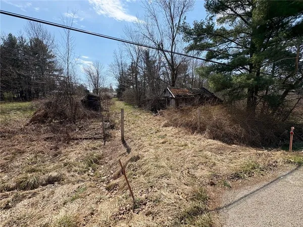 a view of a yard covered with snow in the yard