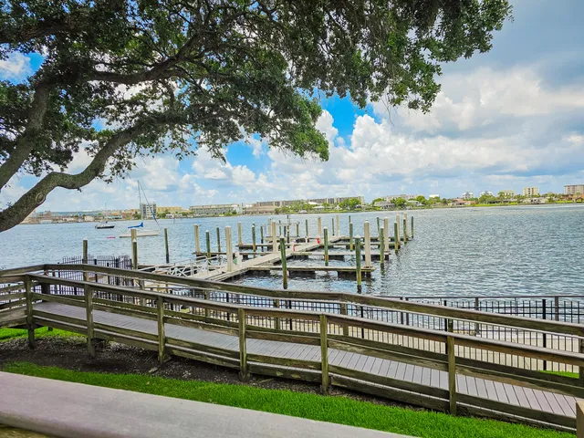 a view of a city with lawn chairs