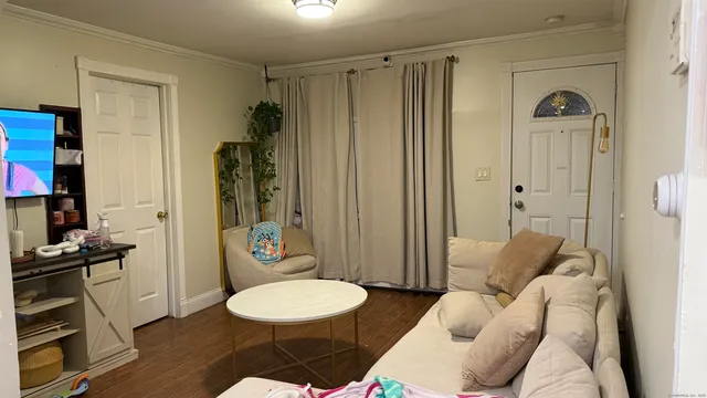 a bathroom with a toilet a sink and shower