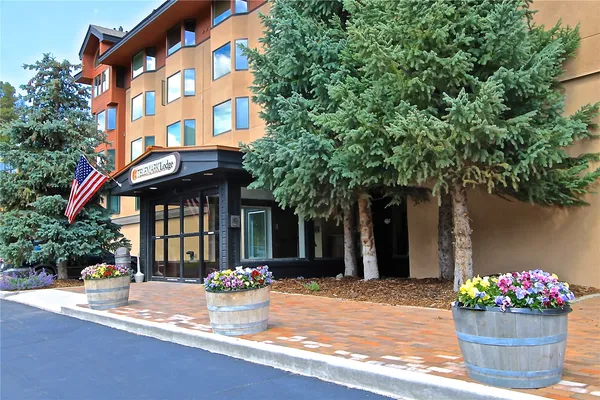 a view of a building with tree s