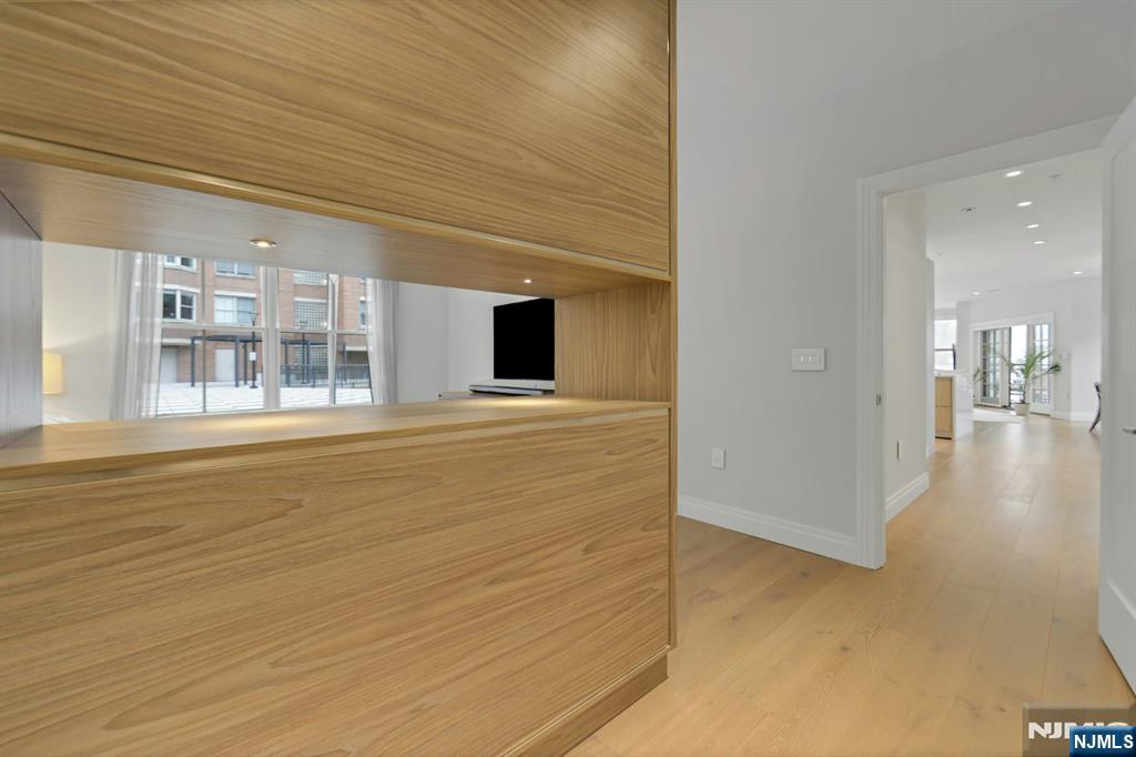 22 Ave At Port Imperial, Unit 114 West New York, NJ 07093 - Photo 21 of 39 a view of a livingroom with wooden floor