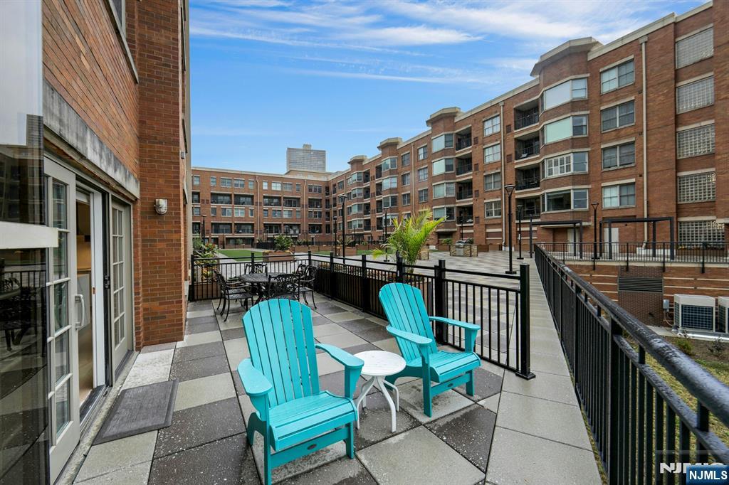 22 Ave At Port Imperial, Unit 114 West New York, NJ 07093 - Photo 27 of 39 a view of balcony with chairs