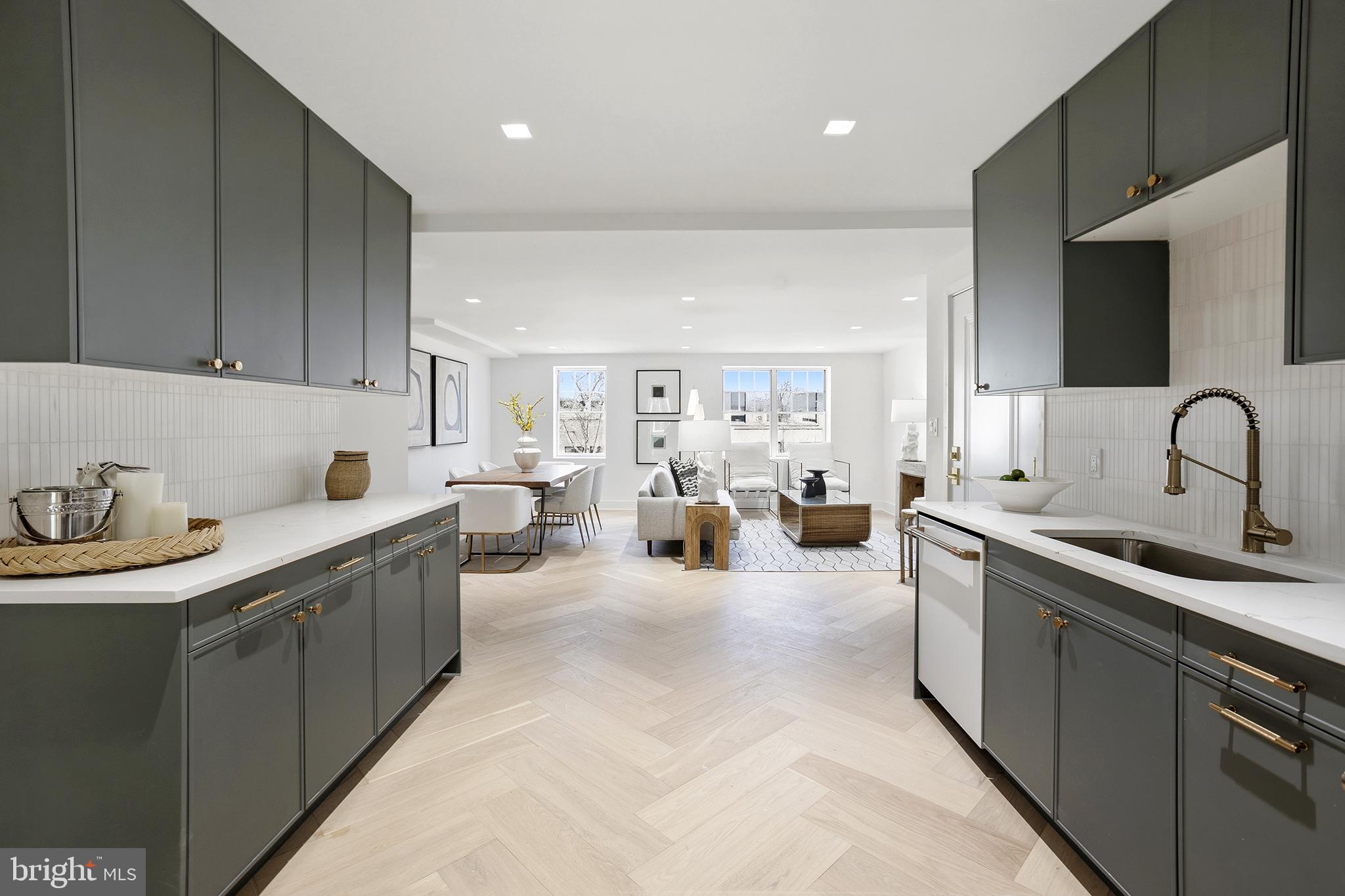 1212 4th Street Northwest, Unit 7 Washington, DC 20001 - Photo 14 of 39 Sleek kitchen with modern elegance.