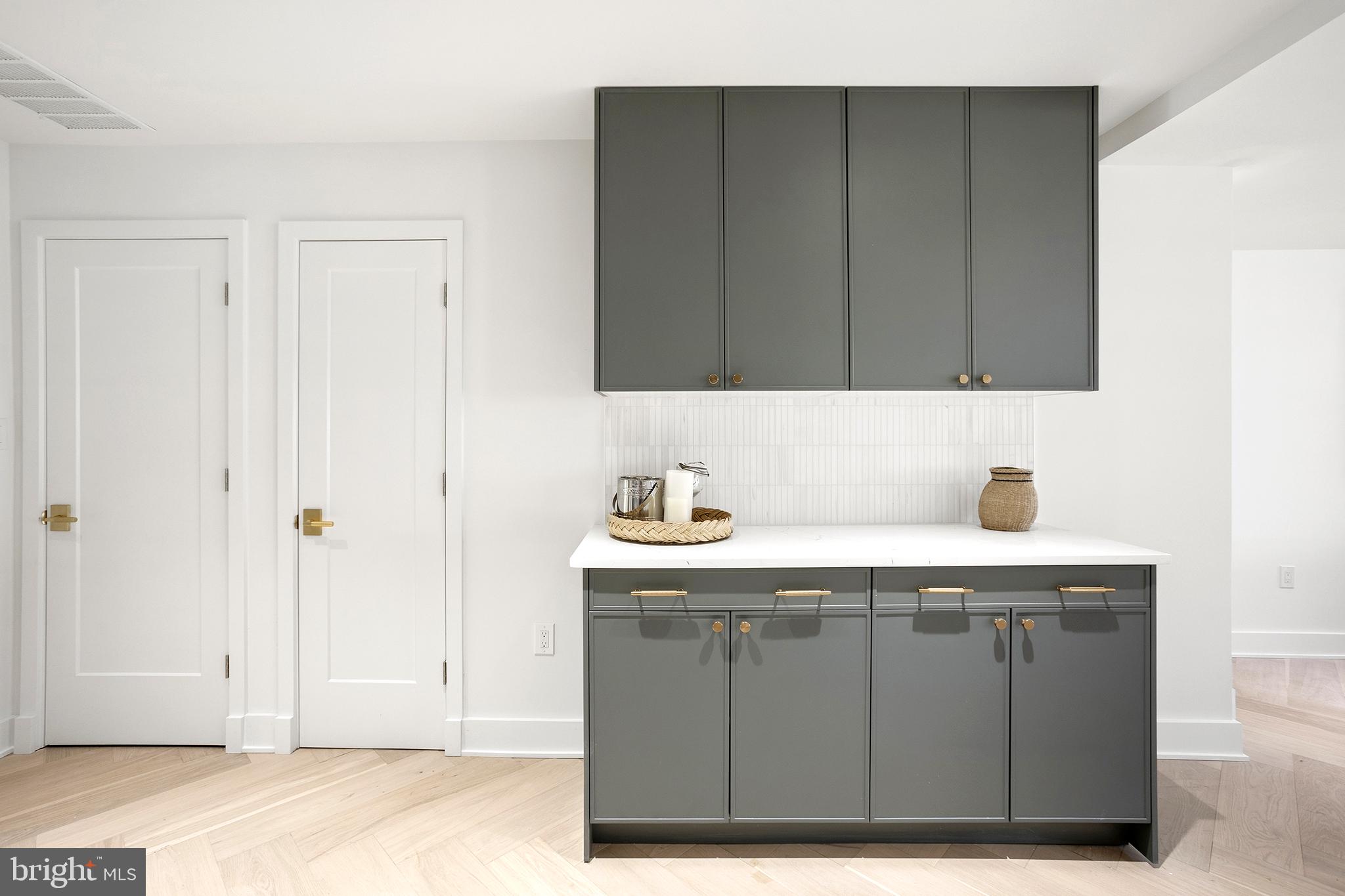 1212 4th Street Northwest, Unit 7 Washington, DC 20001 - Photo 16 of 39 Sleek modern kitchen with elegant finishes.