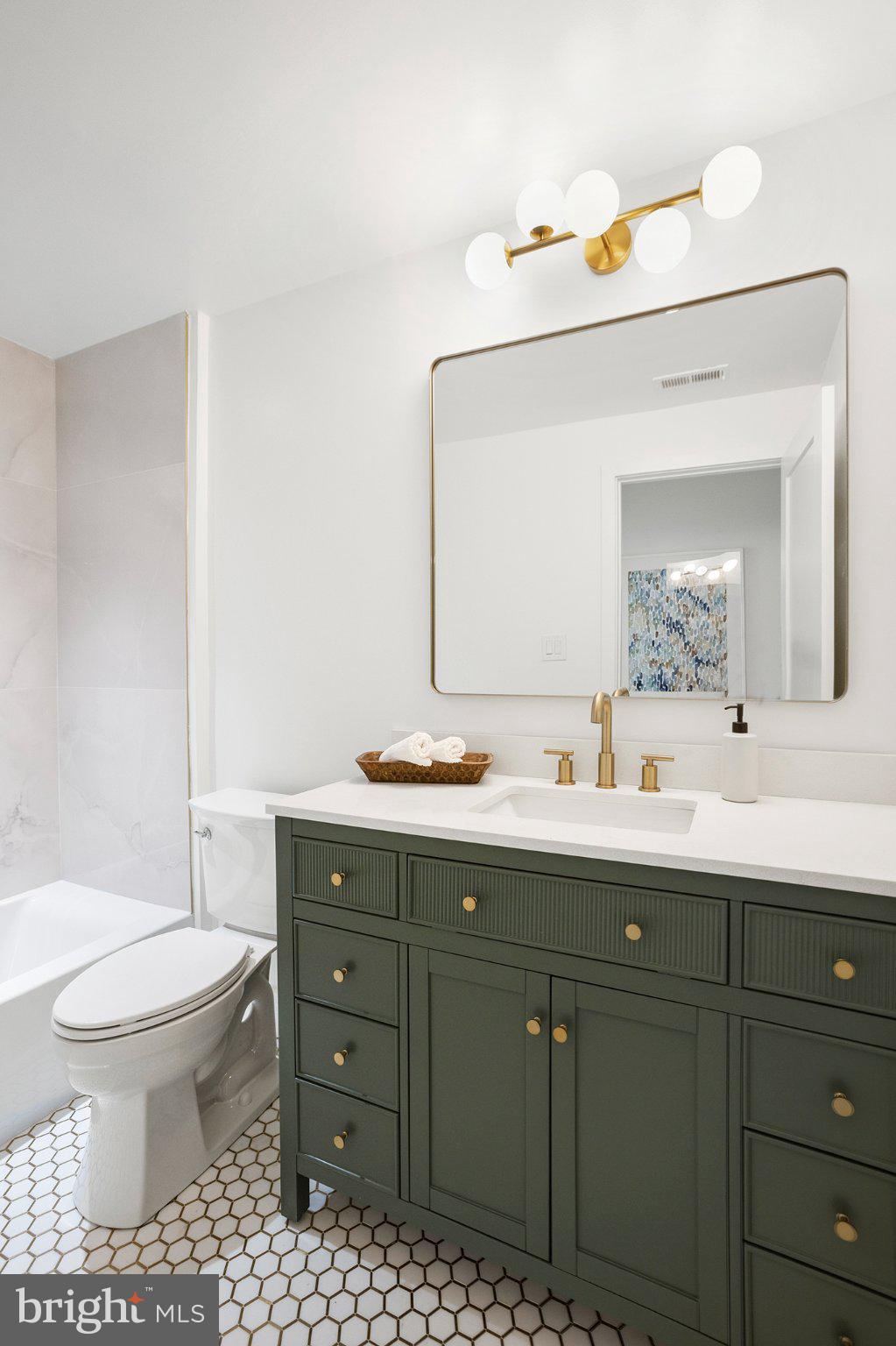 1212 4th Street Northwest, Unit 7 Washington, DC 20001 - Photo 17 of 39 Elegant bathroom with modern accents.