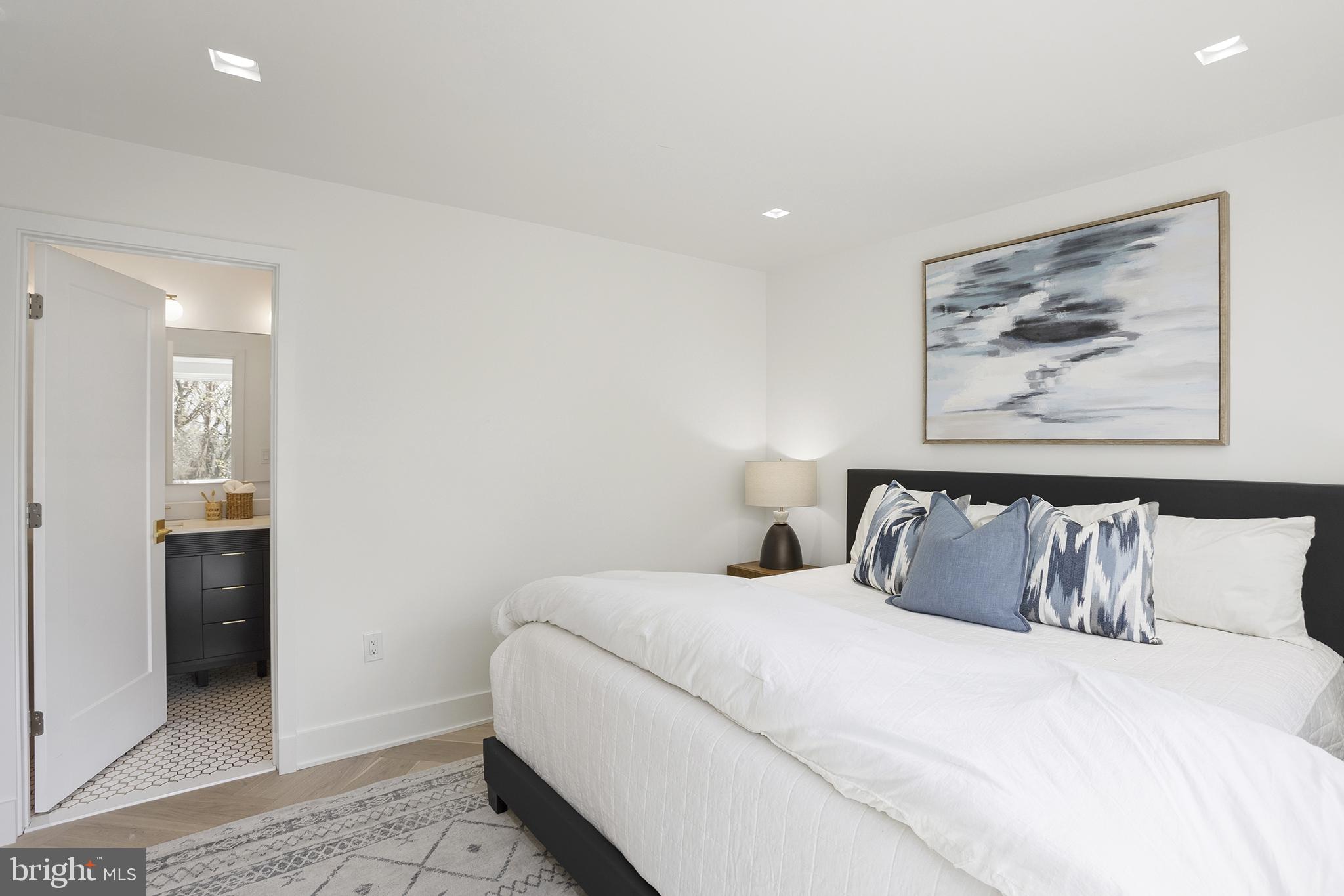 1212 4th Street Northwest, Unit 7 Washington, DC 20001 - Photo 26 of 39 Serene bedroom with modern elegance.