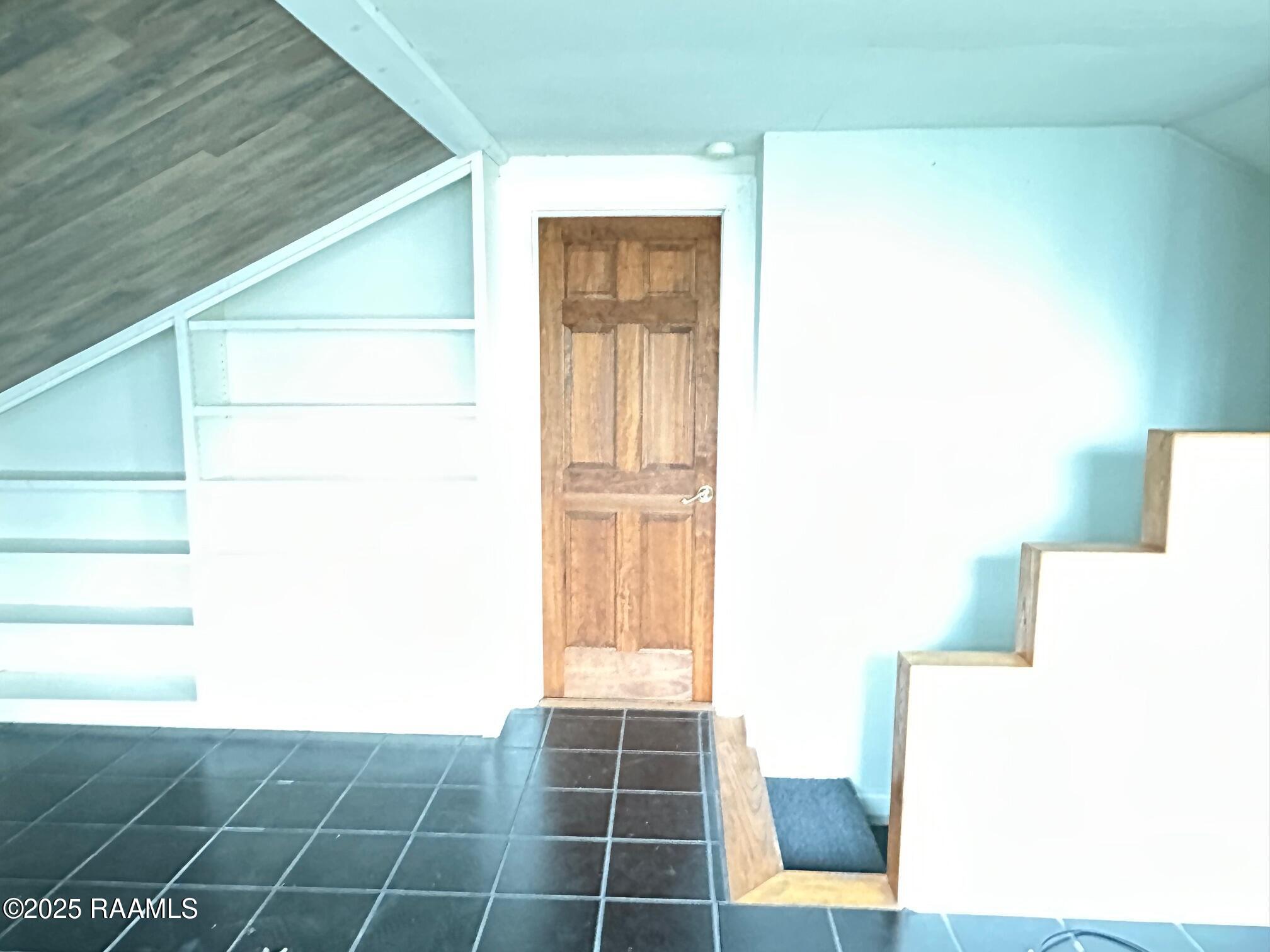 404 Sanders Street Franklin, LA 70538 - Photo 20 of 22 404 stair case to bonus room