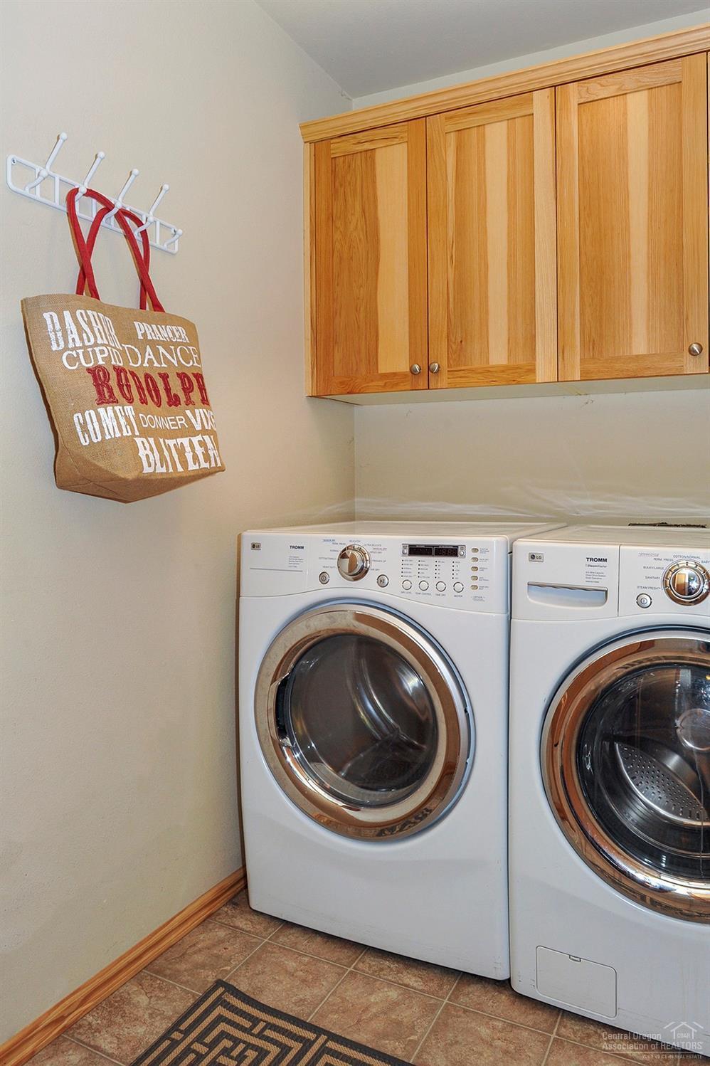 20584 Dylan Loop Bend, OR 97702 - Photo 20 of 20 Main floor laundry room. Situated betwee