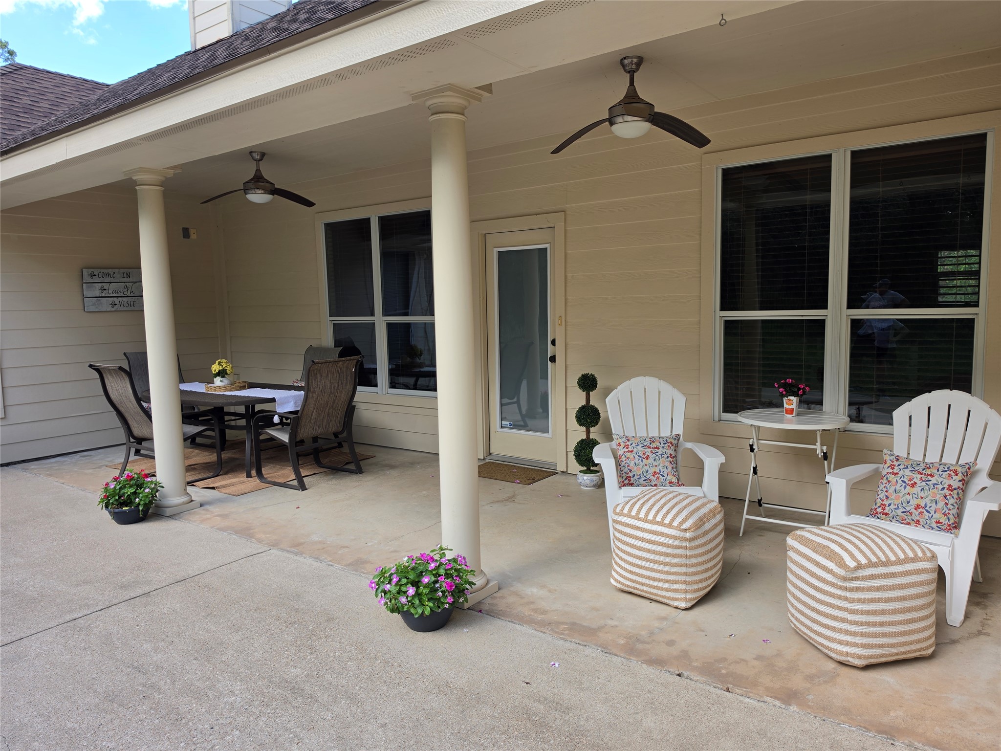 330 Arbors Circle Elgin, TX 78621 - Photo 37 of 37 An inviting covered patio offers ample space for dining and relaxation outdoors.