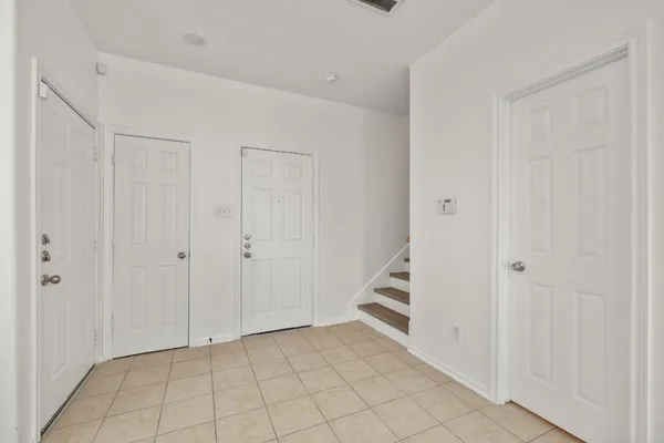 a view of an entryway with staircase