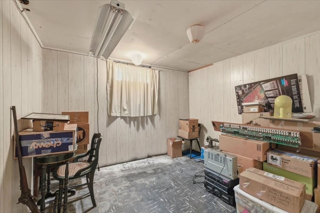 99 Brook Road Sharon, MA 02067 - Photo 30 of 37 a room with furniture a desk and chair