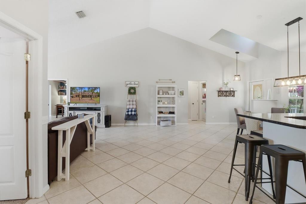 3189 South Graymor Path Inverness, FL 34450 - Photo 15 of 46 a kitchen with stainless steel appliances a stove top oven a refrigerator a sink and dishwasher