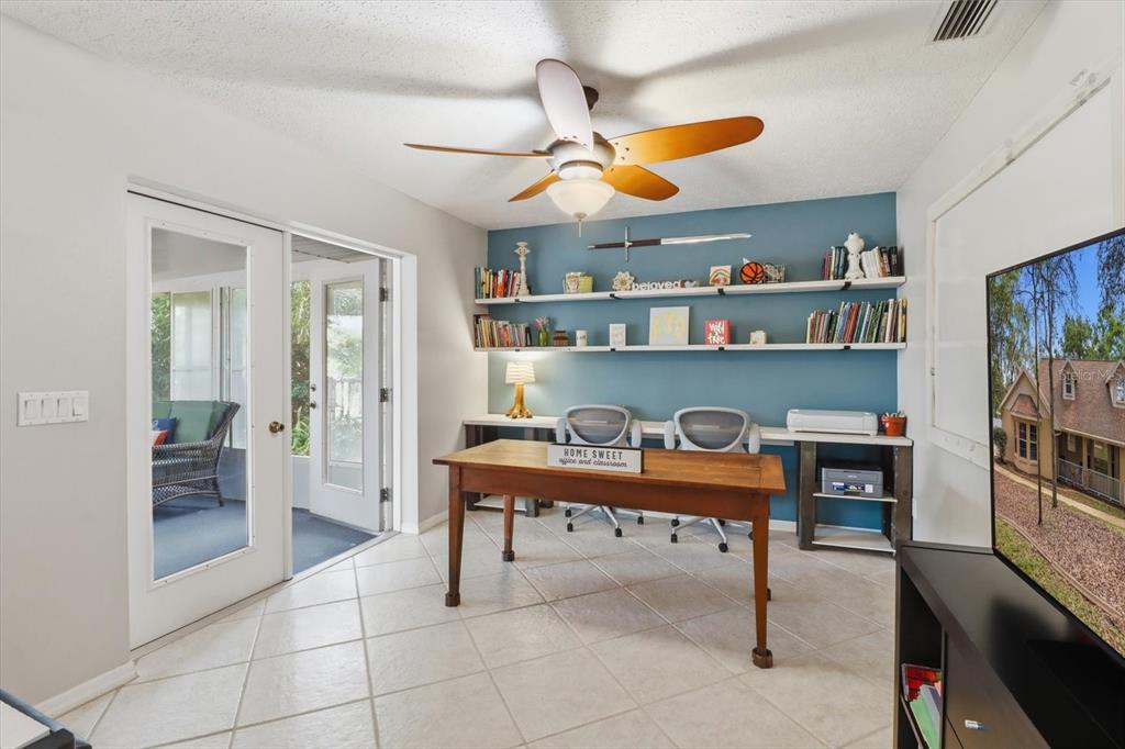 3189 South Graymor Path Inverness, FL 34450 - Photo 27 of 46 a room with furniture a rug and a window