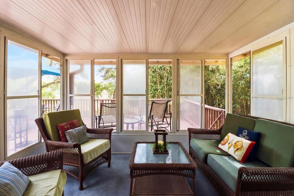 3189 South Graymor Path Inverness, FL 34450 - Photo 36 of 46 a living room with furniture and floor to ceiling windows