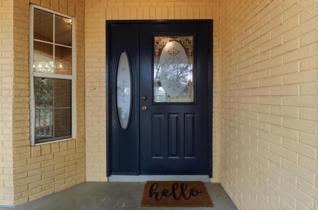 3189 South Graymor Path Inverness, FL 34450 - Photo 5 of 46 a view of front door with wooden door