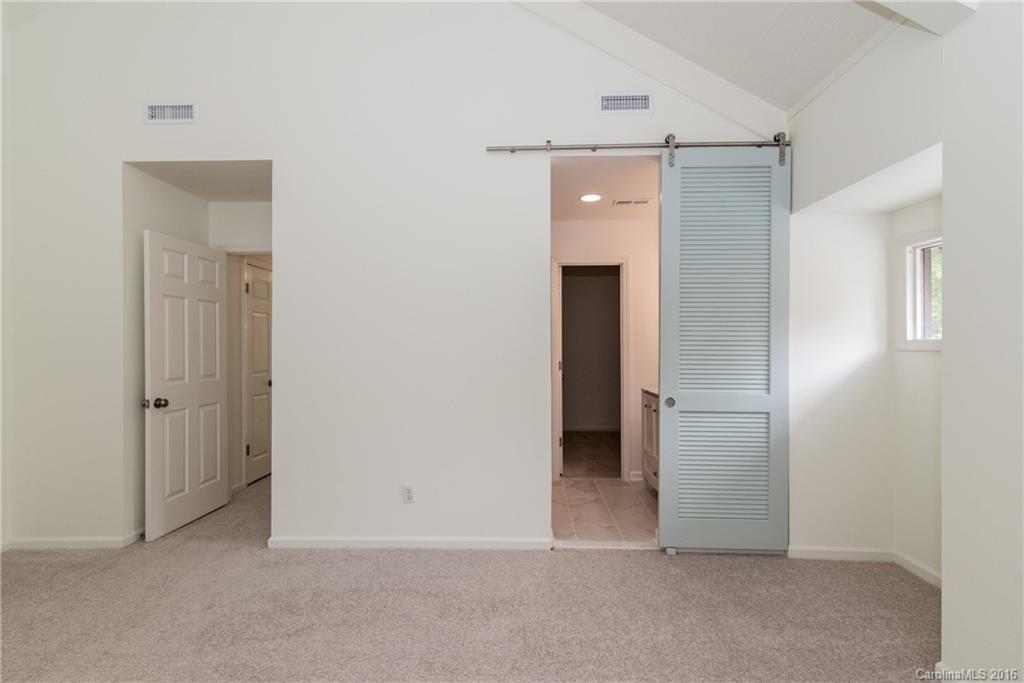 4737 Rounding Run Road, Unit 4737 Charlotte, NC 28277 - Photo 14 of 22 a view of an empty room with closet and a bathroom