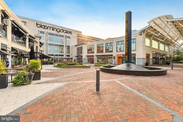 a view of a building with a fountain