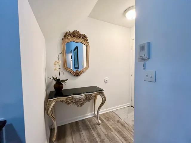 a bathroom with mirror and sink