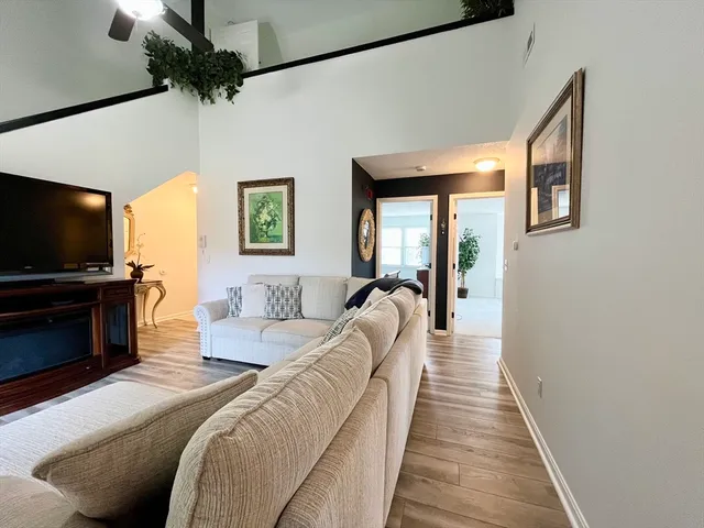 a bed room with a bed and a television