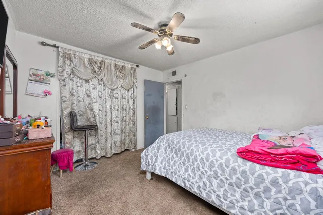 a kitchen with cabinets and window
