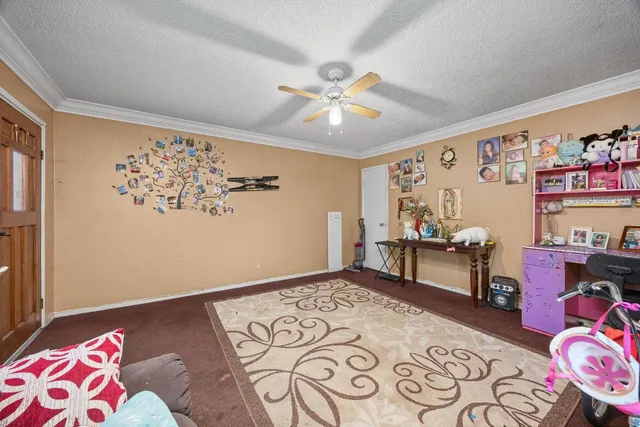 a bedroom with bed and a window