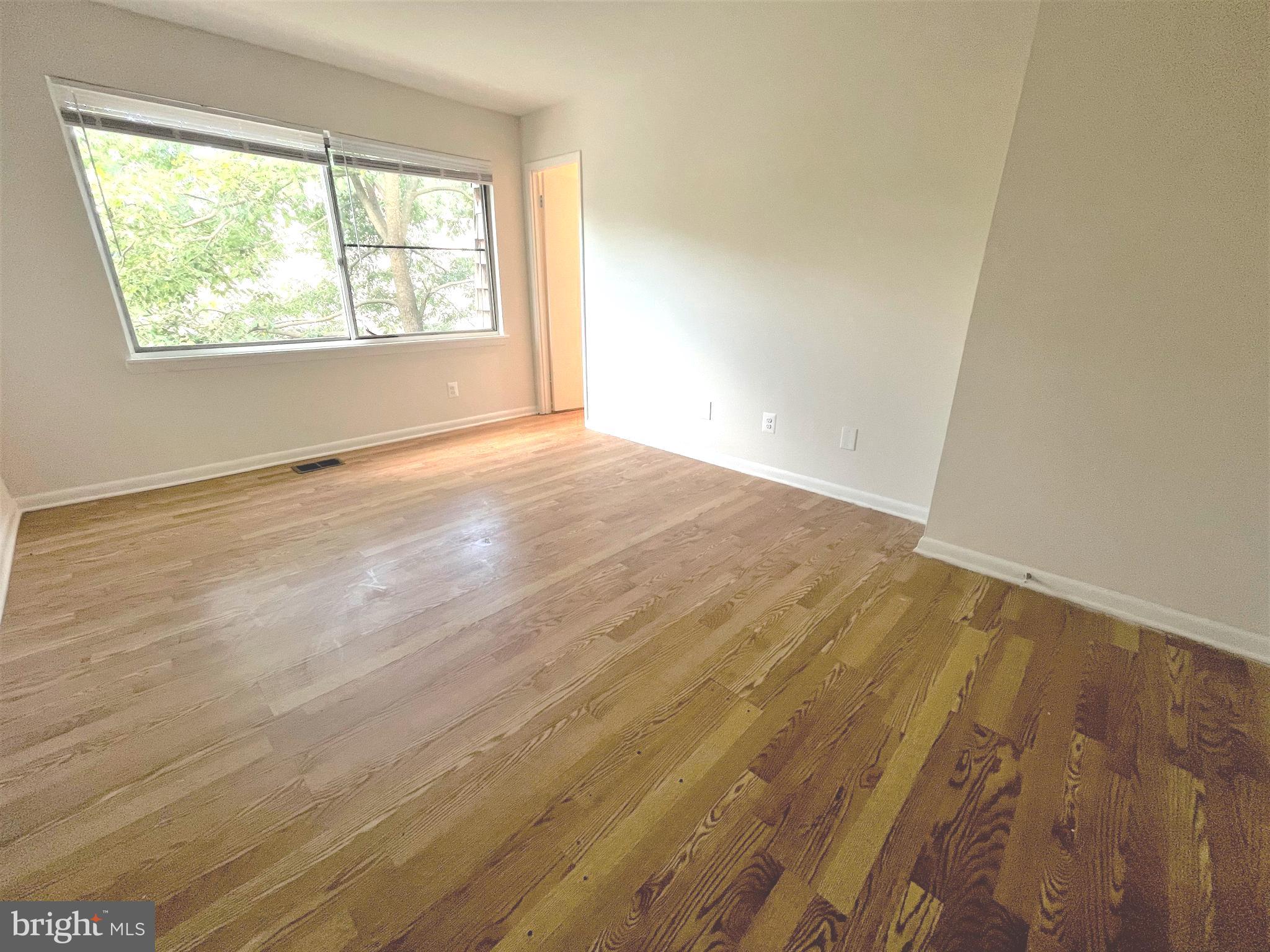 330 West Deer Park Road, Unit 3B Gaithersburg, MD 20877 - Photo 16 of 25 Master bedroom with laminate floors