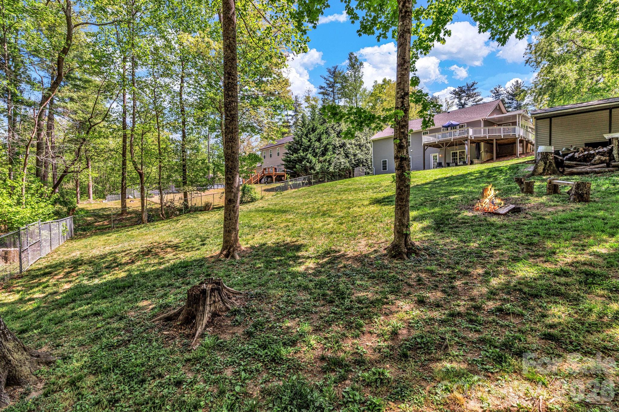 152 Joe Jenkins Road Fairview, NC 28730 - Photo 35 of 44 a view of a house with a yard