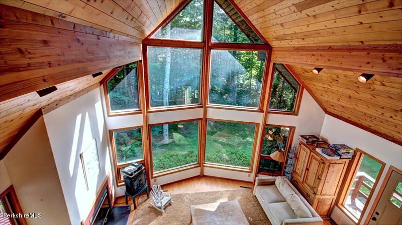517 Dimmock Road Otis, MA 01253 - Photo 13 of 21 a view of an outdoor space with a large window