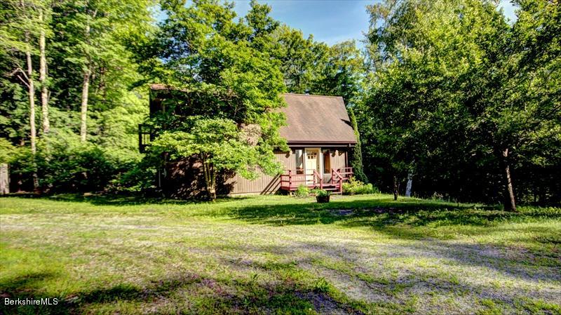 517 Dimmock Road Otis, MA 01253 - Photo 21 of 21 a garden view with a seating space