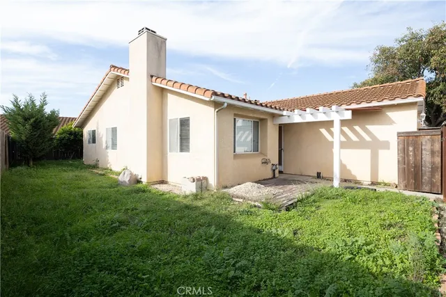 a house view with a garden space