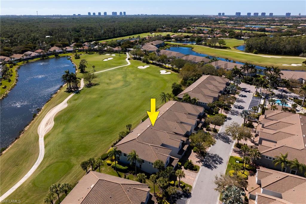 23770 Clear Spring Court, Unit 1408 Estero, FL 34135 - Photo 2 of 33 an aerial view of a residential houses with outdoor space