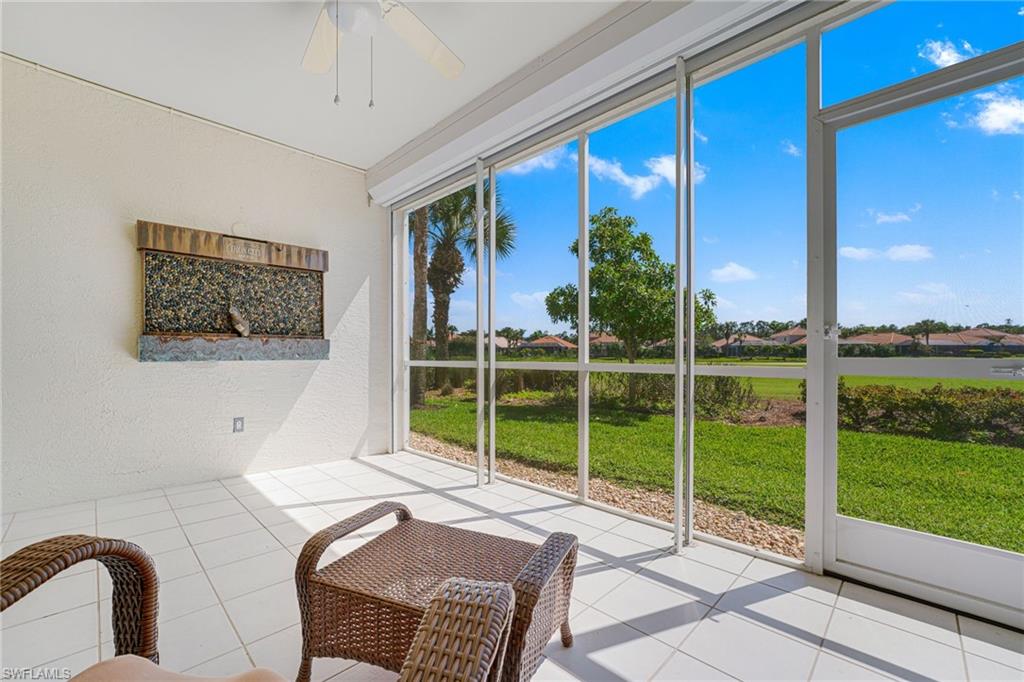 23770 Clear Spring Court, Unit 1408 Estero, FL 34135 - Photo 21 of 33 a living room with windows