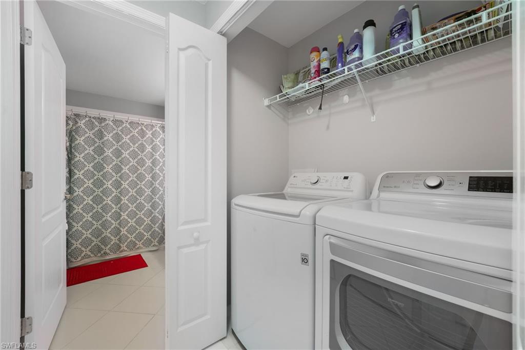 23770 Clear Spring Court, Unit 1408 Estero, FL 34135 - Photo 22 of 33 a utility room with dryer and washer