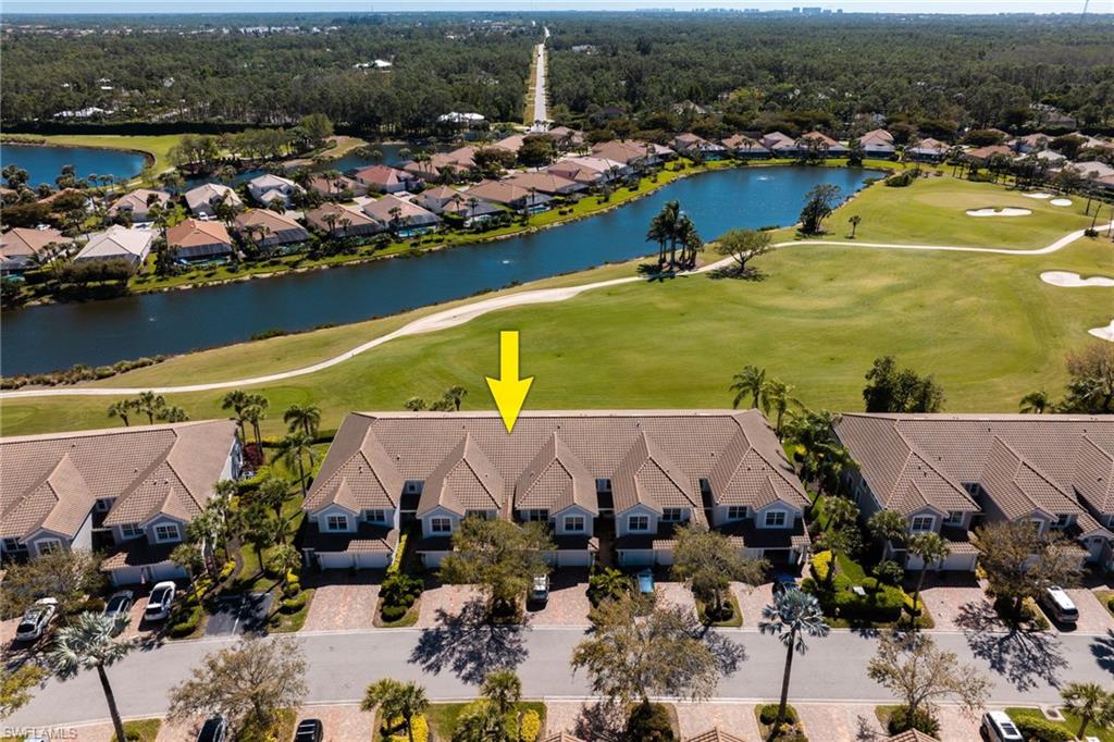 23770 Clear Spring Court, Unit 1408 Estero, FL 34135 - Photo 23 of 33 an aerial view of residential houses with outdoor space