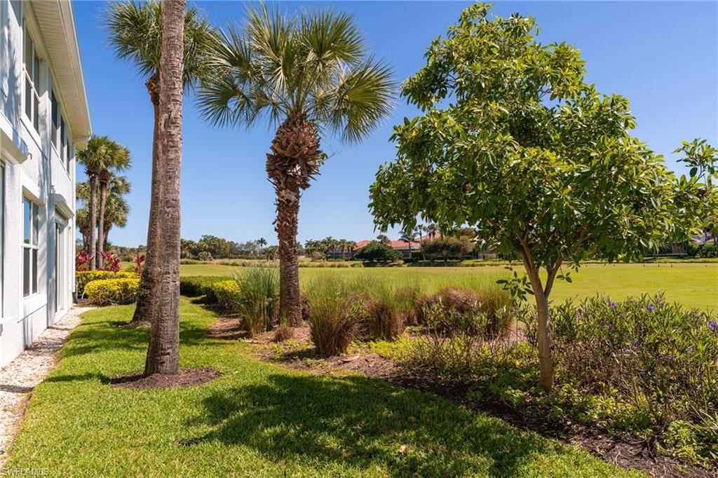23770 Clear Spring Court, Unit 1408 Estero, FL 34135 - Photo 32 of 33 a view of a lake with houses
