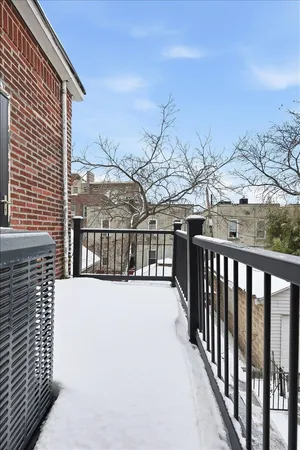 a view of a balcony with a pot