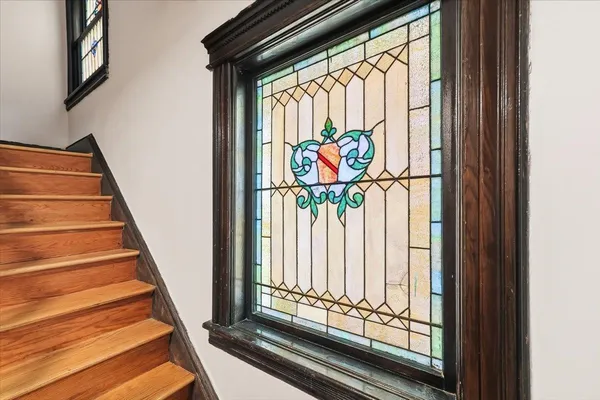 a view of a hallway with washer and dryer