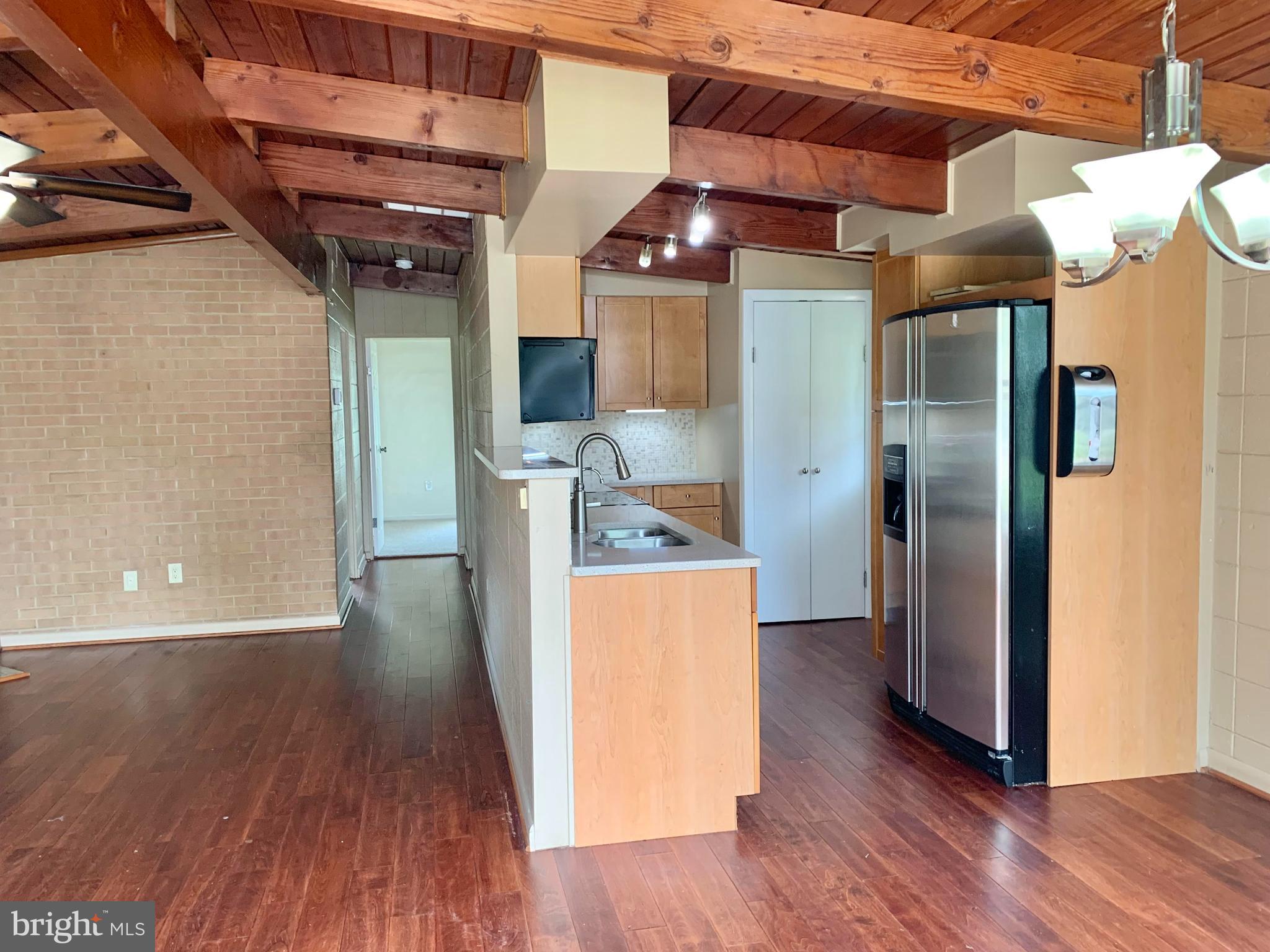 221 Beverley Avenue Edgewater, MD 21037 - Photo 14 of 35 VIEW OF KITCHEN AND HALLWAY TO BEDROOMS