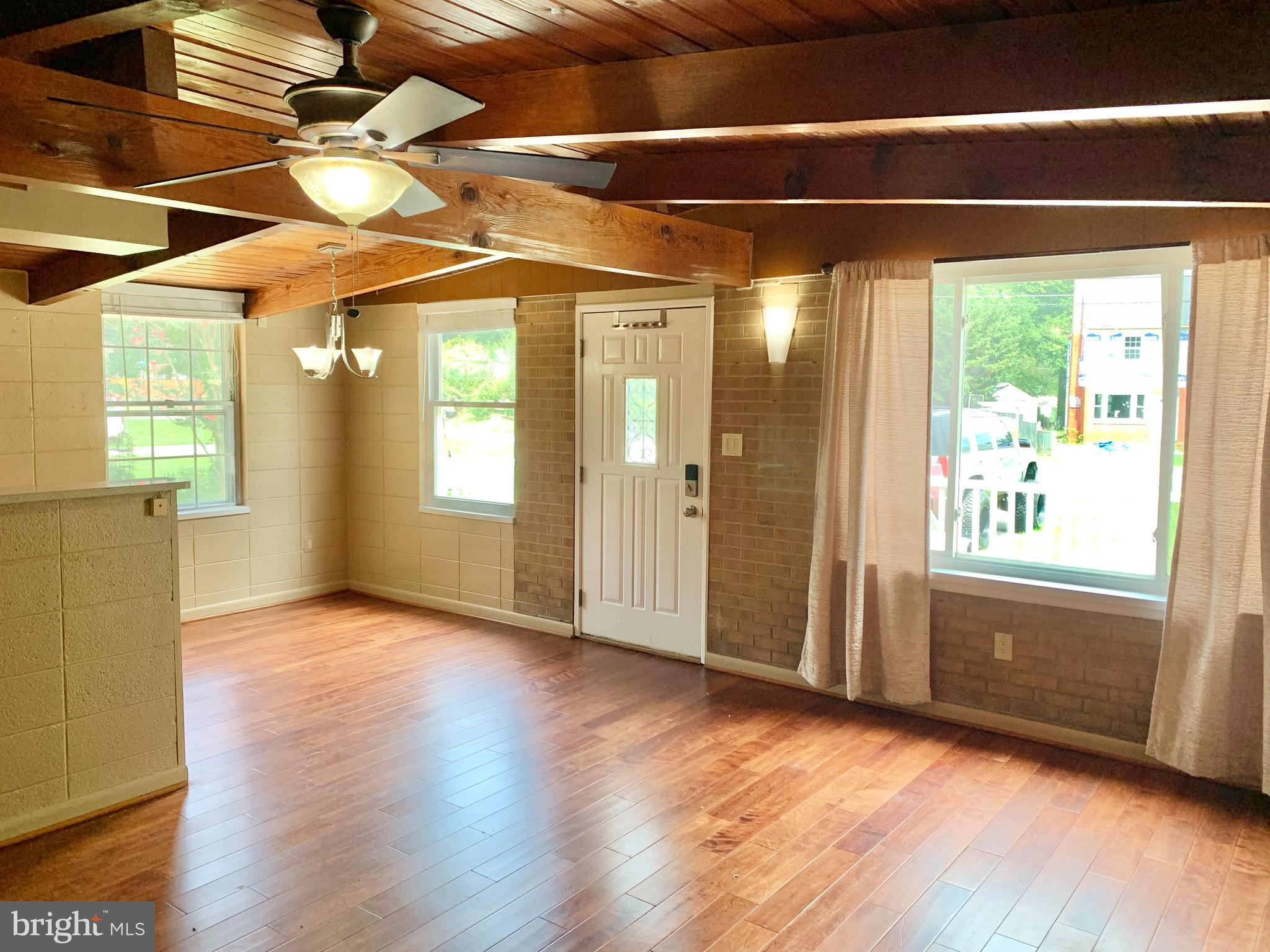 221 Beverley Avenue Edgewater, MD 21037 - Photo 3 of 35 FRONT DOOR ENTRANCE AND DINING ROOM