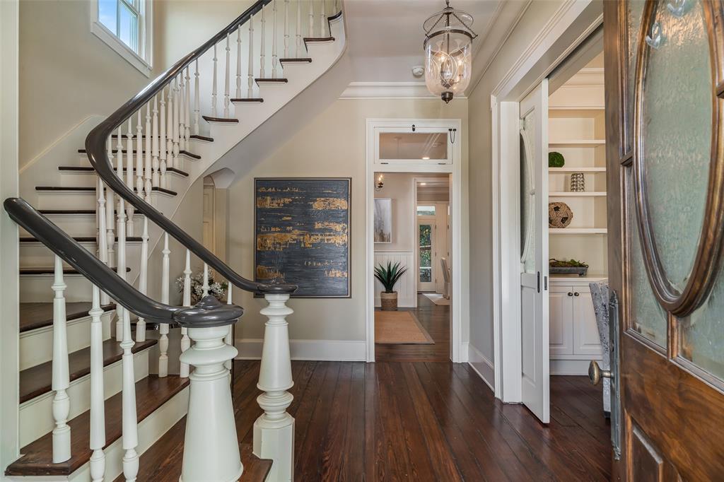 2315 Routh Street Dallas, TX 75201 - Photo 5 of 38 a view of entryway with wooden floor and a front door