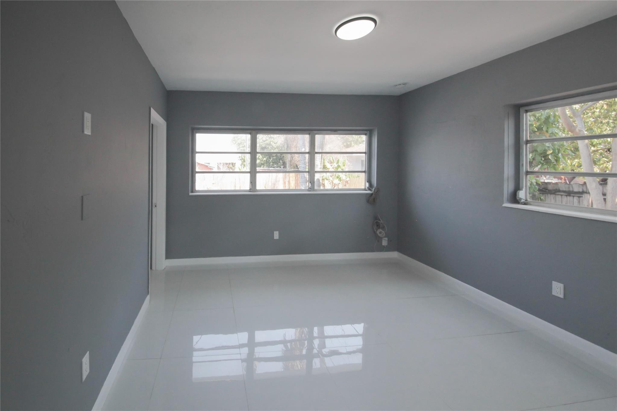 2221 Southwest 13th Street Miami, FL 33145 - Photo 12 of 24 an empty room with windows