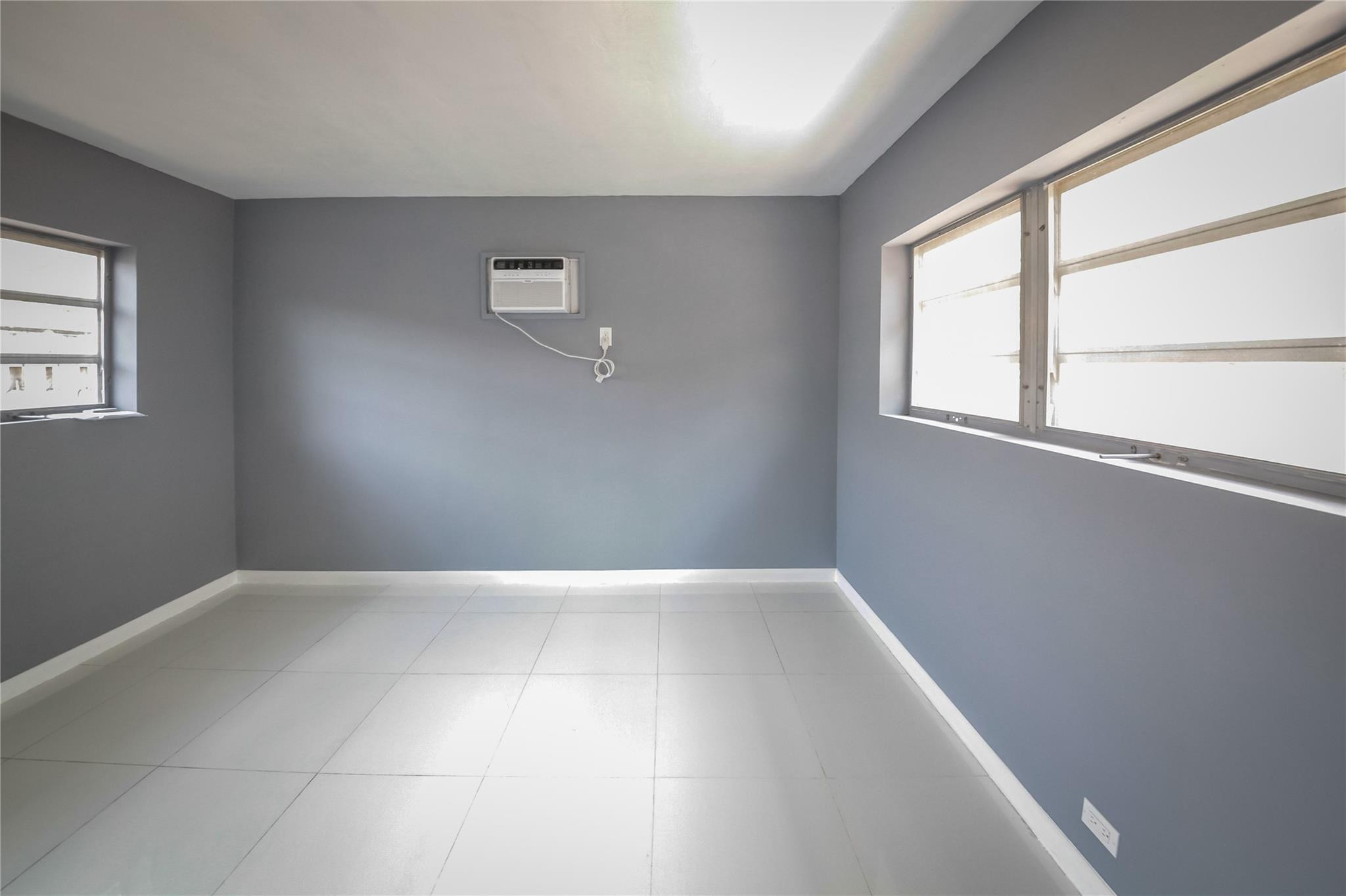 2221 Southwest 13th Street Miami, FL 33145 - Photo 21 of 24 an empty room with windows
