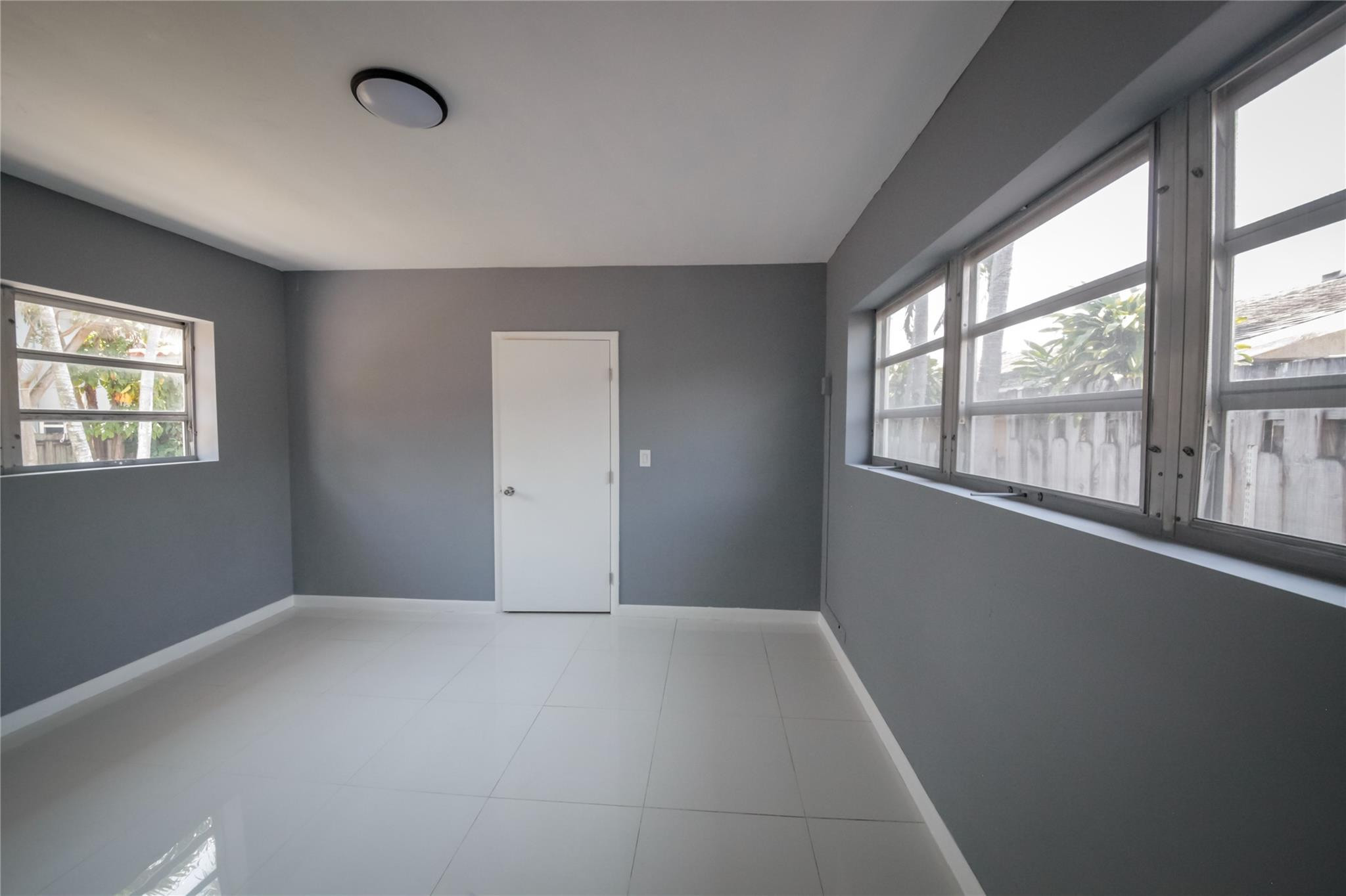2221 Southwest 13th Street Miami, FL 33145 - Photo 22 of 24 a view of an empty room with a window