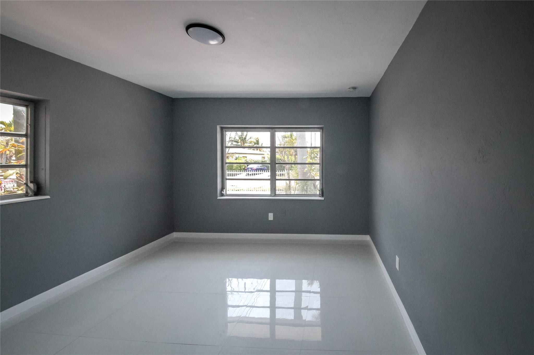 2221 Southwest 13th Street Miami, FL 33145 - Photo 8 of 24 a view of an empty room with a window