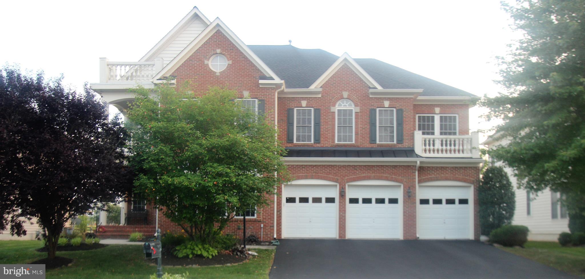 41885 Feldspar Place Stone Ridge, VA 20105 - Photo 3 of 97 3-Car Front Load Garage