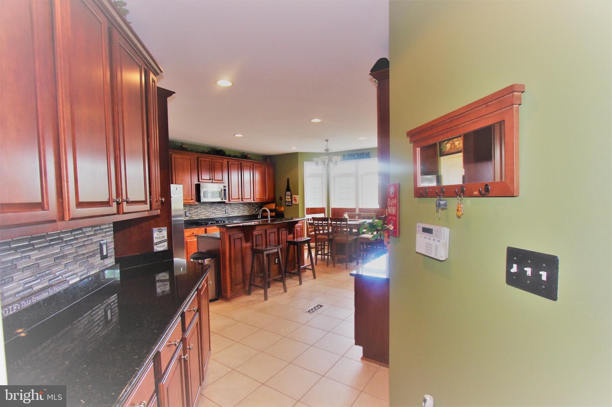 41885 Feldspar Place Stone Ridge, VA 20105 - Photo 27 of 97 Gourmet Kitchen w/Breakfast Area