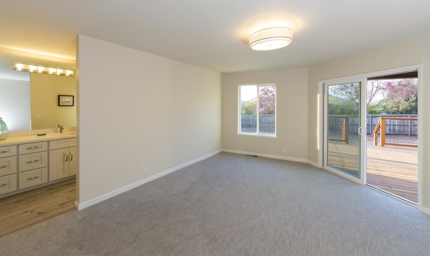 134 Hughes Road Watsonville, CA 95076 - Photo 16 of 26 a view of an empty room with window and cabinet